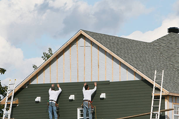 Professional Siding technician working in Urbana, OH